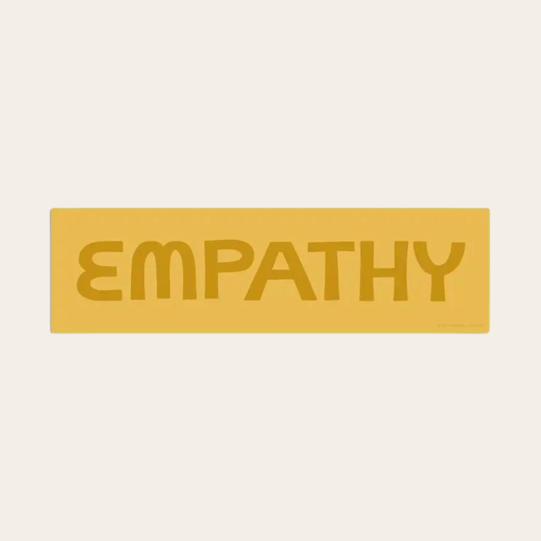 Empathy sticker with brown text on yellow background