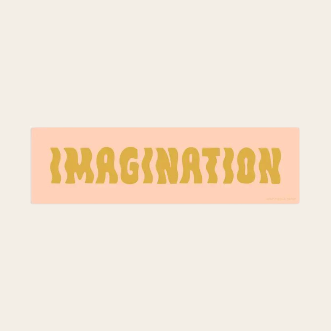 Imagination sticker with yellow text on pink background