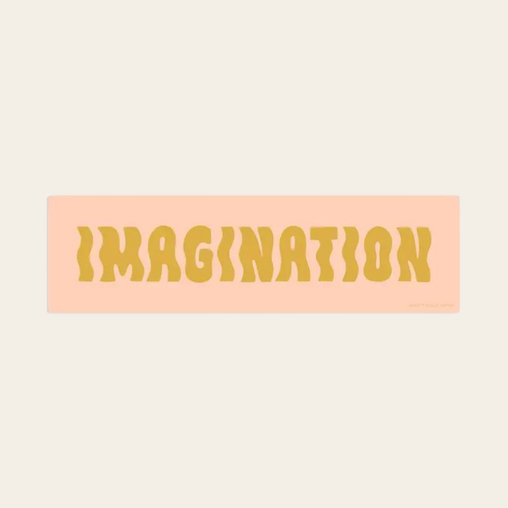 Imagination sticker with yellow text on pink background