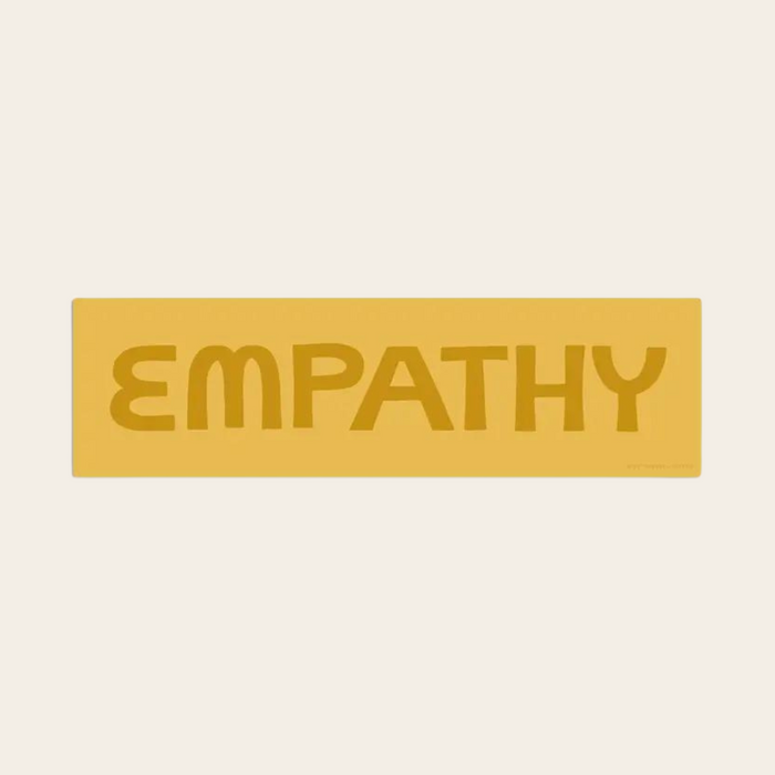 Empathy sticker with brown text on yellow background