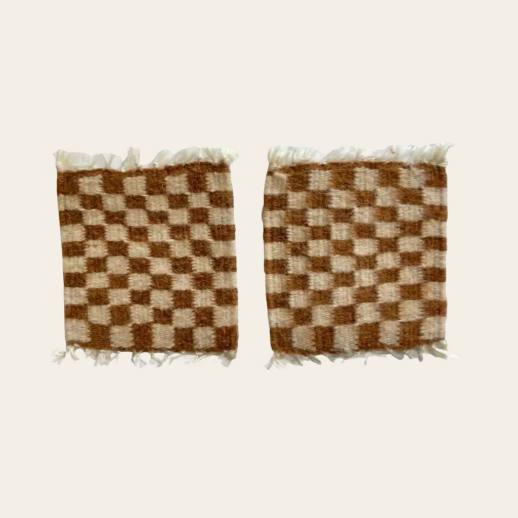 Handwoven checkered brown and cream wool coasters made in Oaxaca, Mexico